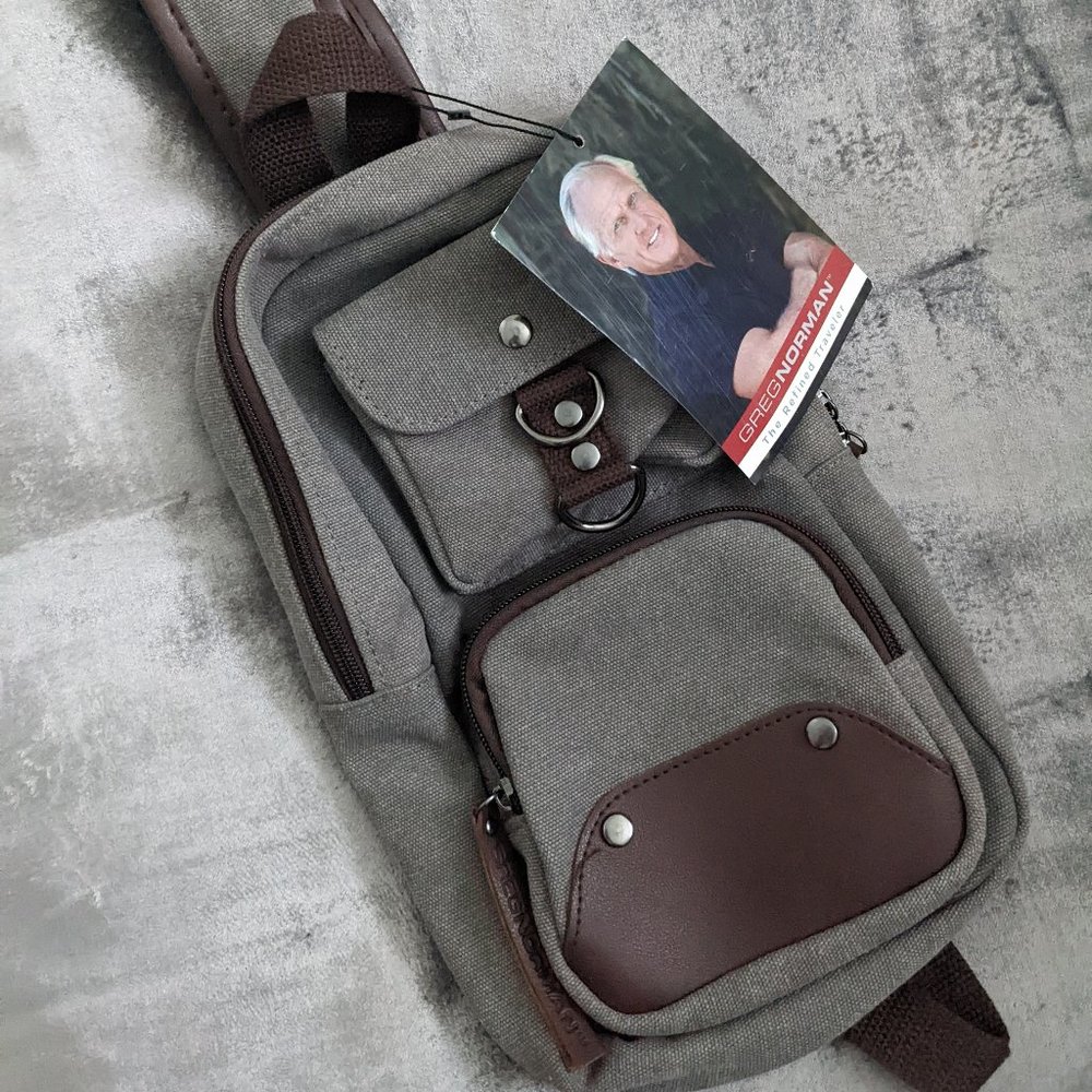 NWT GREG NORMAN Canvas Leather Sling Bag Cross Body